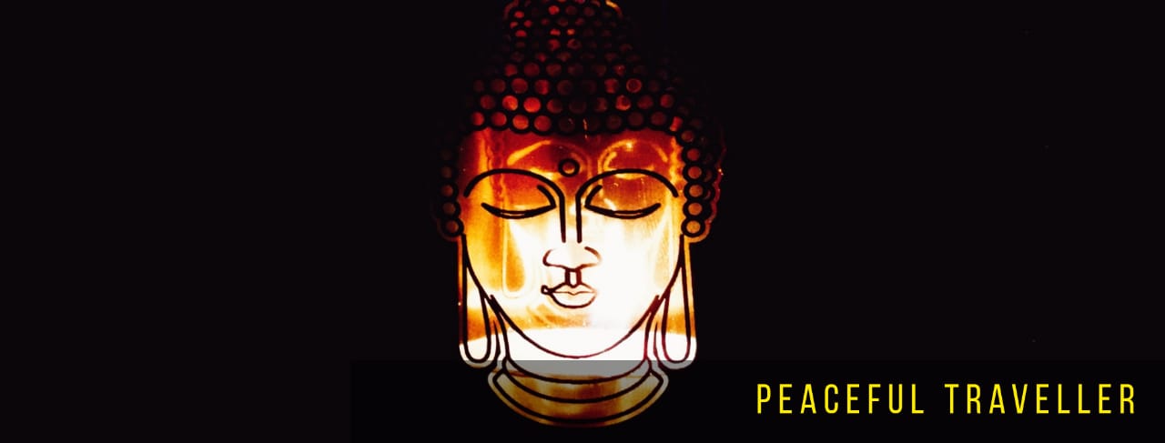 peaceful traveller logo